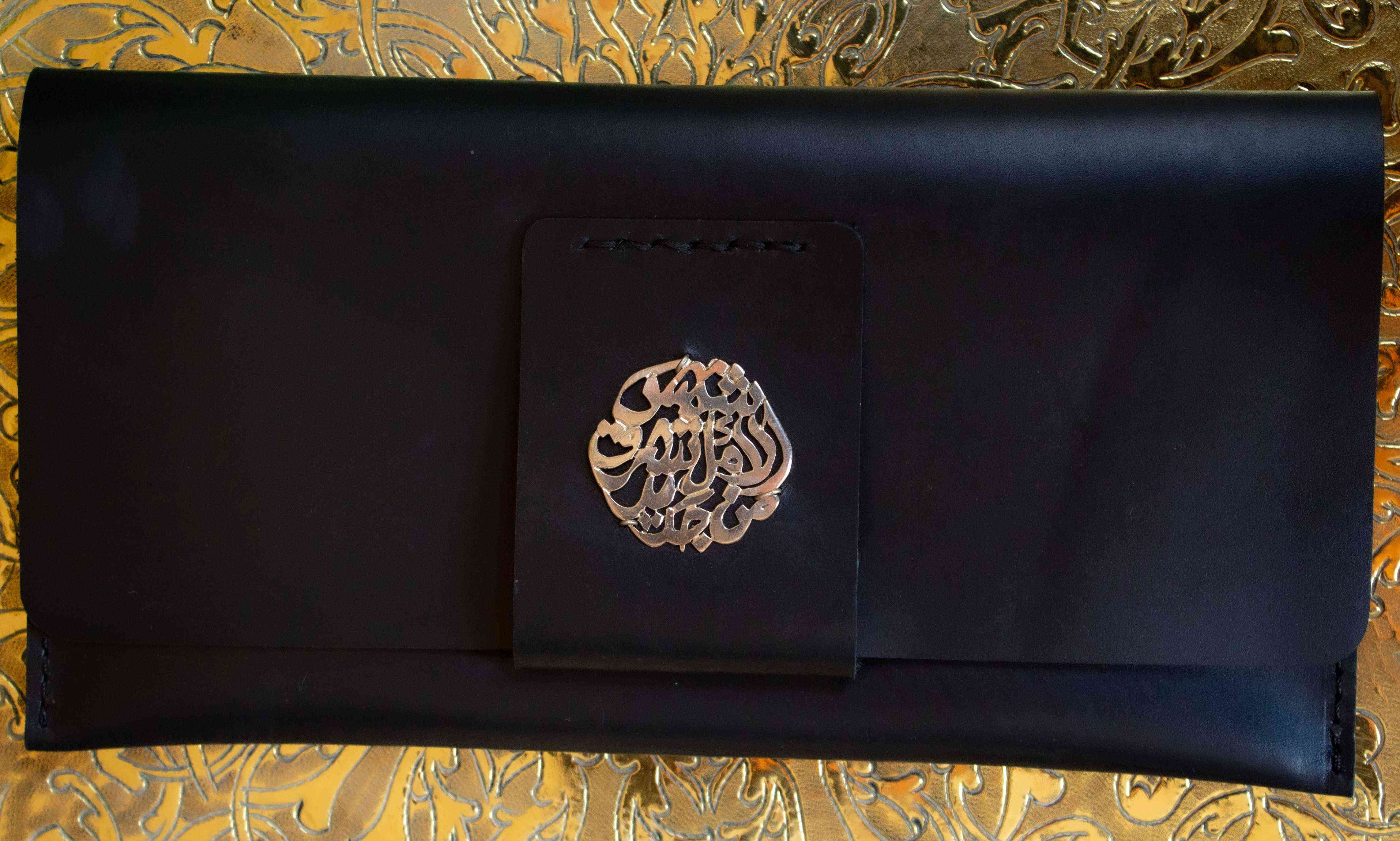 Pochette en cuir noir